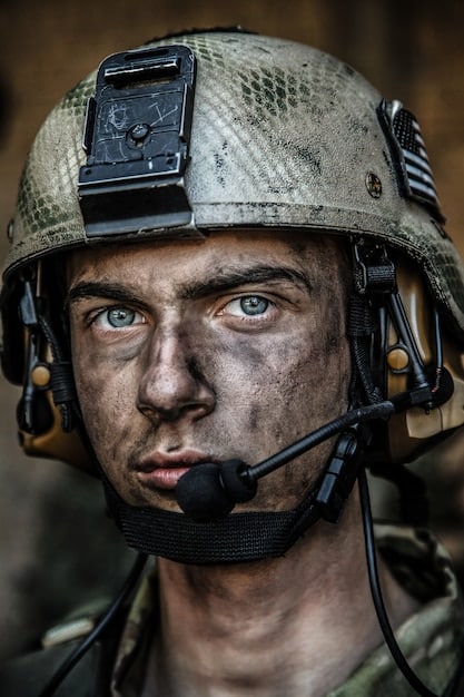 A close-up image of a soldier wearing a heads-up display powered by AI, showing real-time battlefield analysis and target identification. The soldier's face should reflect a mix of concentration and concern, highlighting the cognitive overload and the potential for over-reliance on AI systems. The backdrop should be a blurred representation of a war zone under hazy conditions.