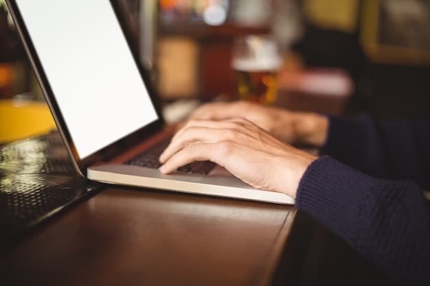 A close-up of a person's hands typing on a laptop keyboard, with legal documents and law books subtly blurred in the background, representing the everyday use of AI in legal practices.